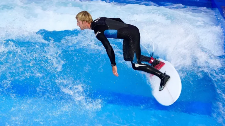 A young man surfing on an ocean